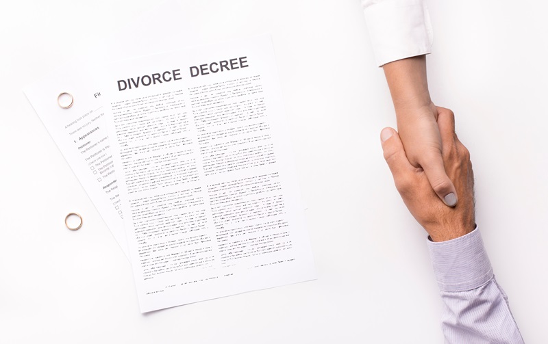 Husband and wife giving permission to break up, unhappy couple get divorced in lawyers office, marriage dissolution concept